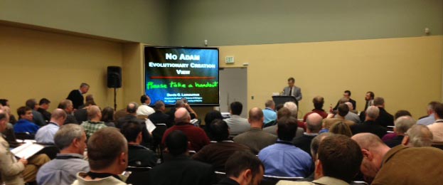 Photo of Denis O. Lamoureux presenting the "no Adam" view at ETS